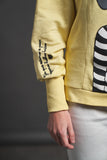 ANABEL LEE. SUDADERA " HUELLAS "